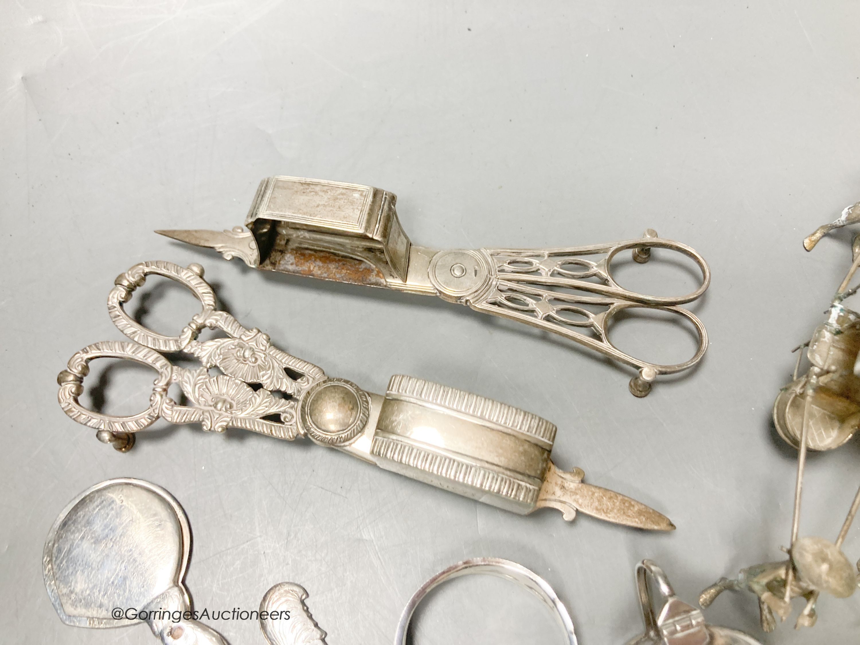 Sundry small silver including a pair of George III silver candle snuffers, Emes & Barnard, London, 1813, 17.4cm, another earlier pair, London, 1795, three silver condiments and other items.